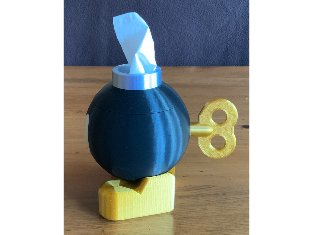 Small bob-omb with tissue top facing left